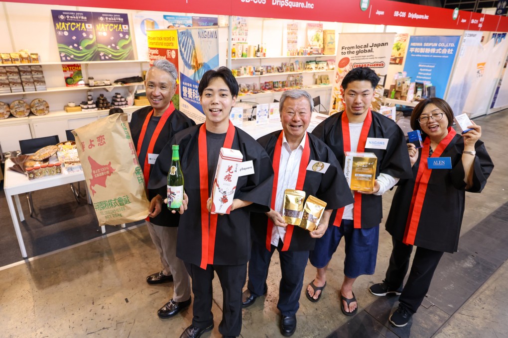 DripSquare CEO Eiri Yokota (second from left) and Feng Xia (right), head of overseas markets at Alen International, are hoping to make their mark at the fair. Photo: Nora Tam