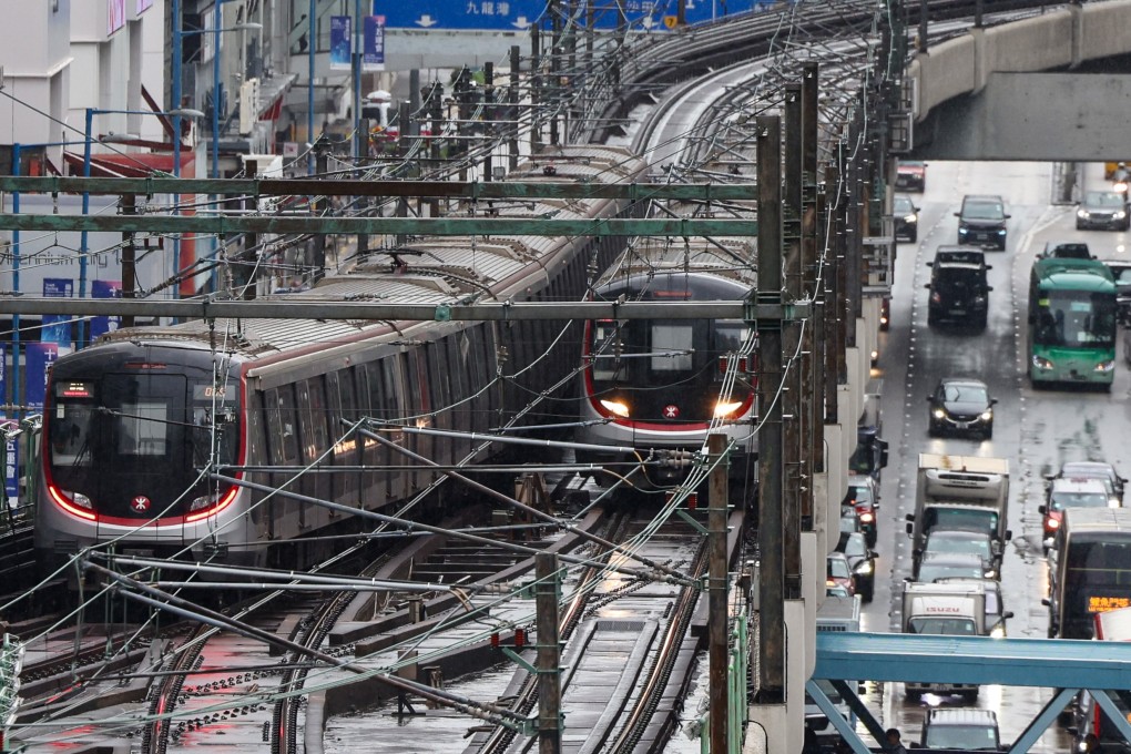 Two MTR trains pull into the platform at Kwun Tong Station. Photo: Karma Lo