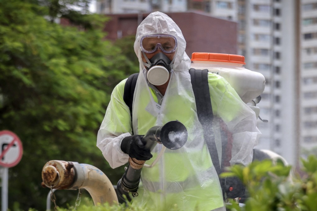 Workers from the Food and Environmental Hygiene Department carry out Aedes mosquito control at Lei Tung Estate. Photo: Karma Lo