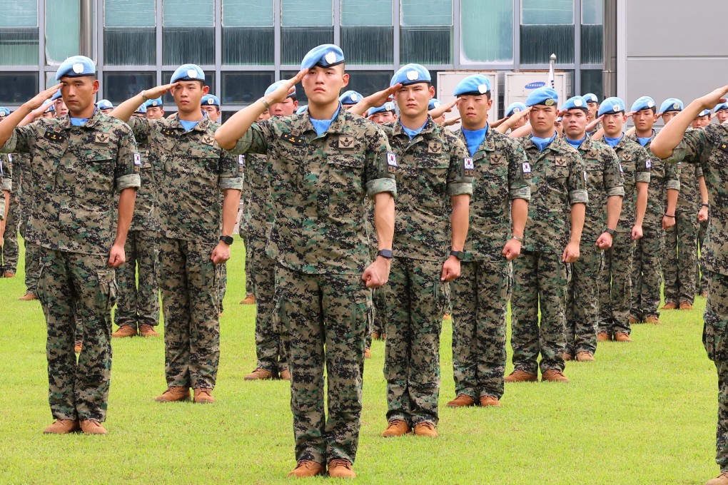 South Korean soldiers to be deployed as as part of a UN peacekeeping force salute during their send-off ceremony at a military base in Incheon last year. Photo: Yonhap/EPA