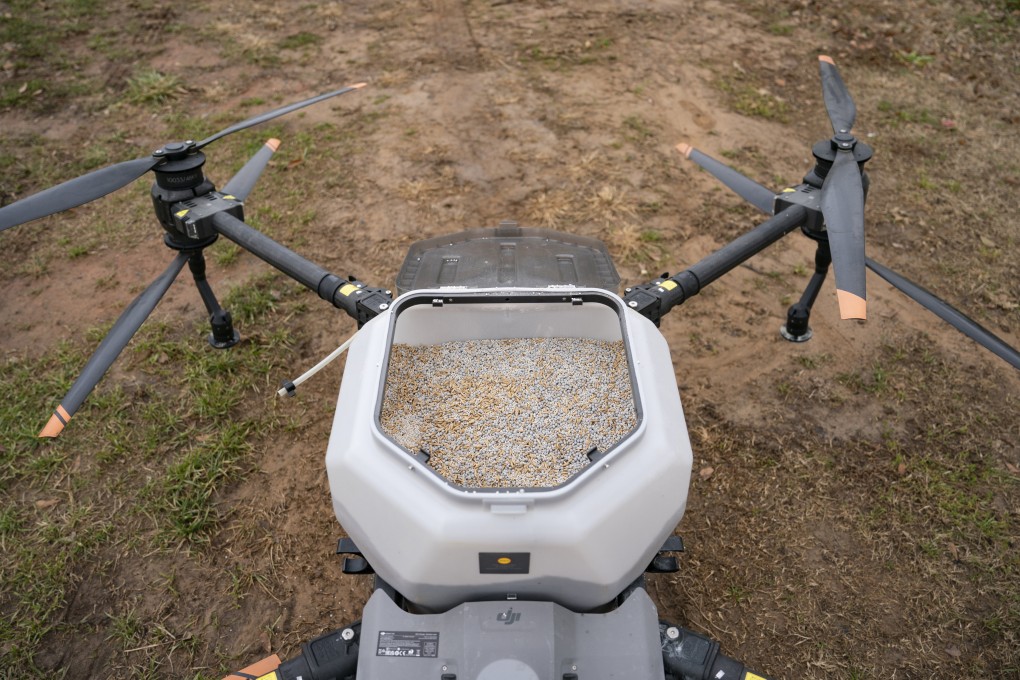A farmer uses a DJI drone to sow his fields in North Carolina, US. The Chinese drone maker is increasingly targeting agriculture and other commercial applications. Photo: AP
