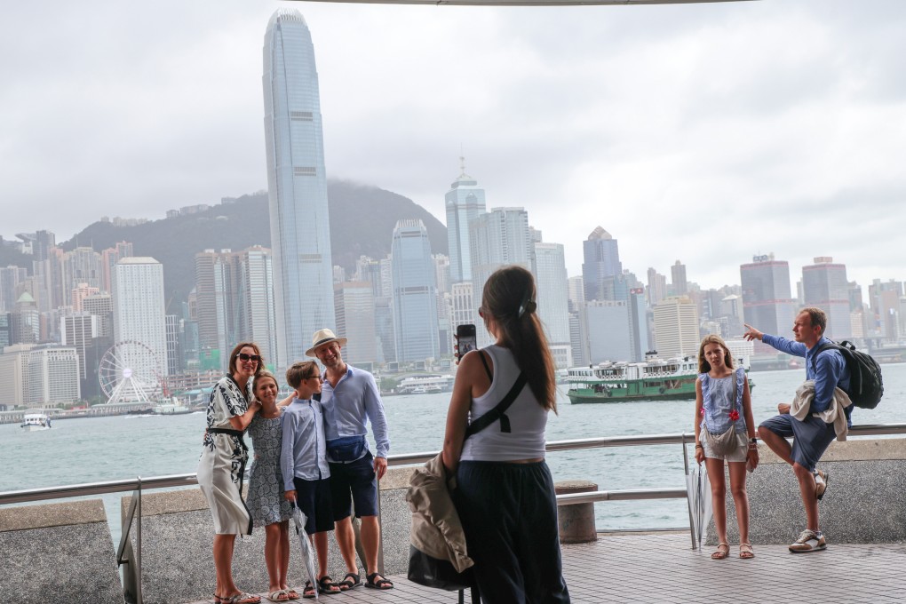 Tourists visit the Tsim Sha Tsui waterfront. Photo: Jelly Tse