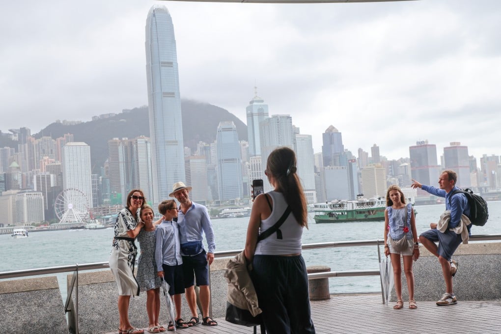 Tourists visit the Tsim Sha Tsui waterfront. Photo: Jelly Tse