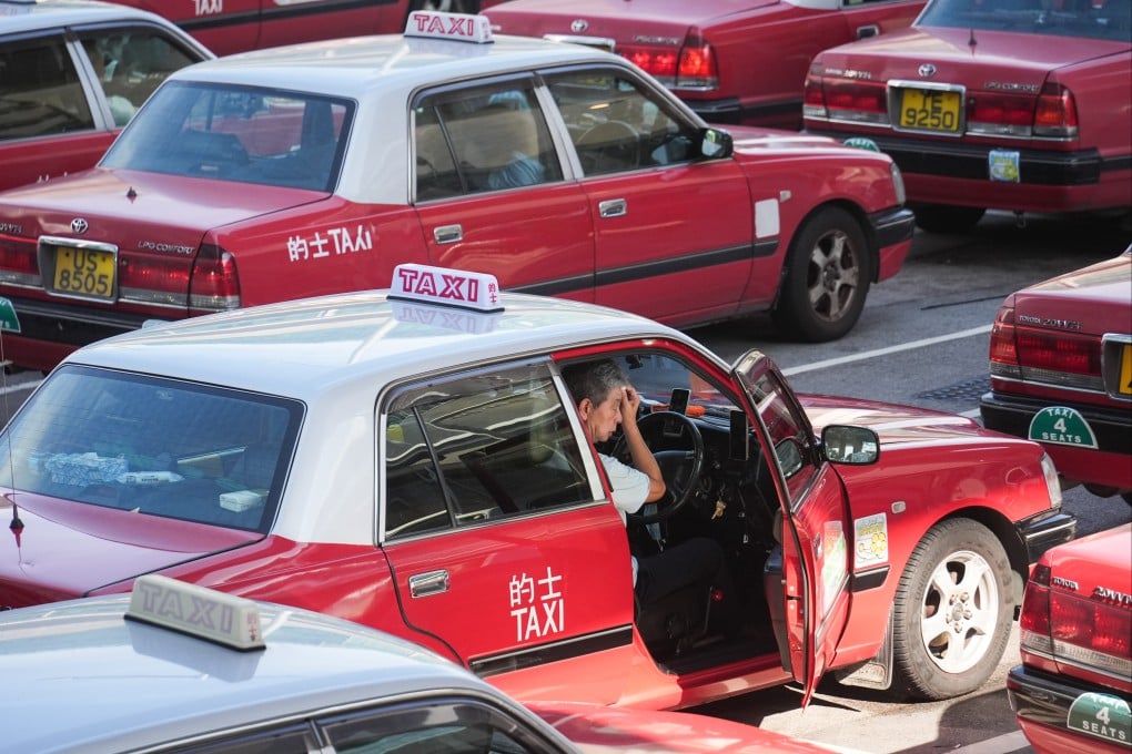 Elderly taxi drivers at Hong Kong International Airport in Chek Lap Kok. Photo: Eugene Lee