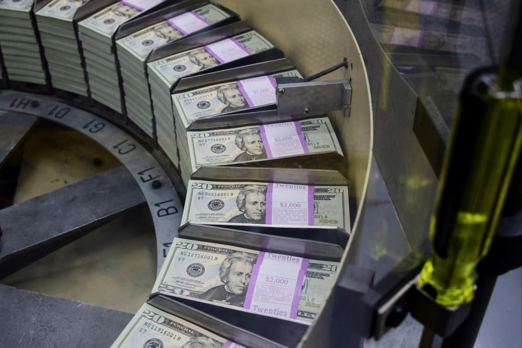 Concerns are mounting over rising debt in the United States, and China is gradually trimming its holdings of Treasuries to hedge against a decline in US dollar asset value. Photo: AFP