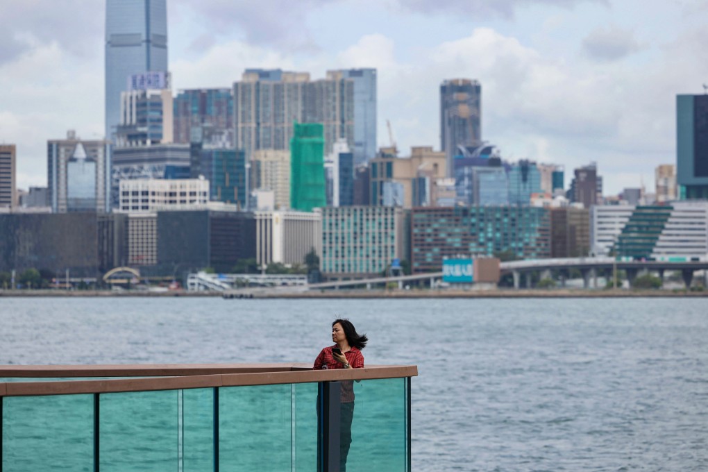 A resident enjoys the breeze on the East Coast Boardwalk in North Point. Photo: Karma Lo