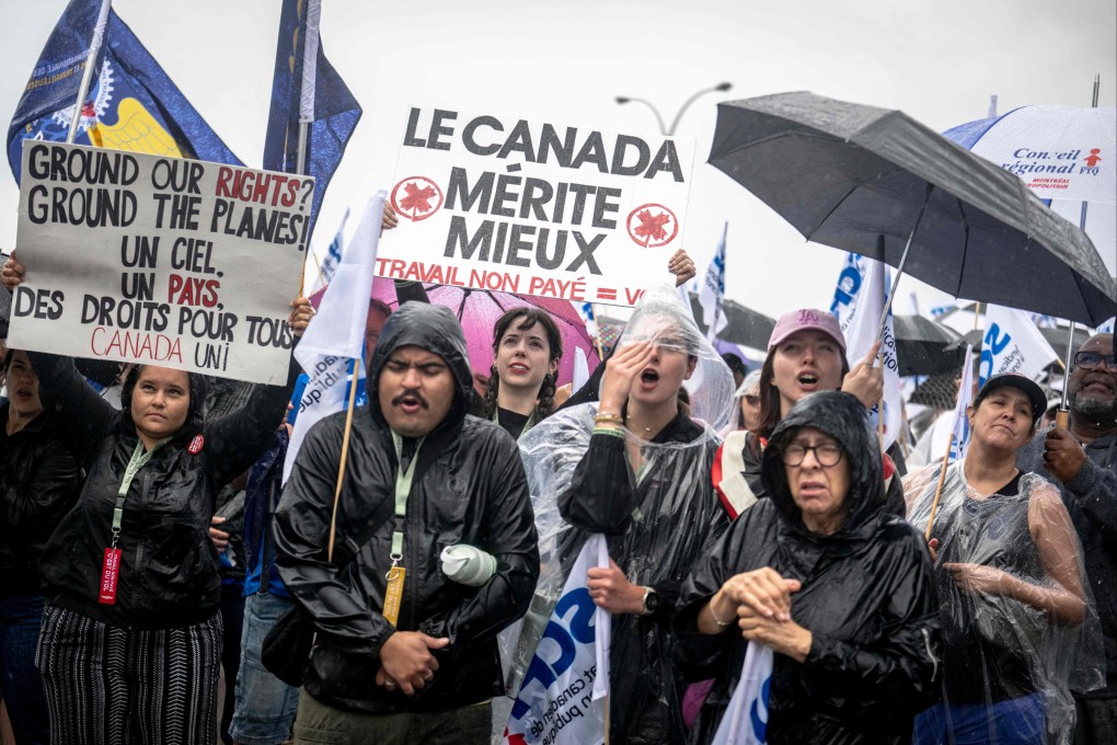 Flight attendants protest in front of the Air Canada headquarters near Pierre-Elliott Trudeau Airport in Montreal, Quebec, Canada on Sunday. Photo: AFP