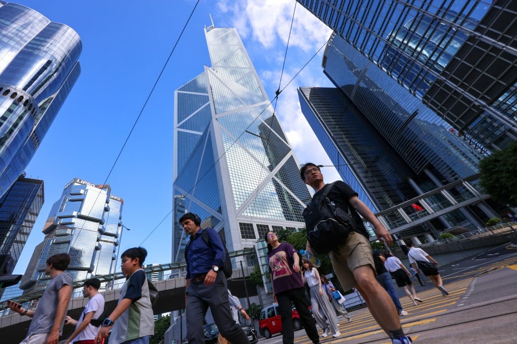 Pedestrians in Central. Authorities said 110,000 Top Talent Pass visas had been approved as of the end of July. Photo: Jelly Tse