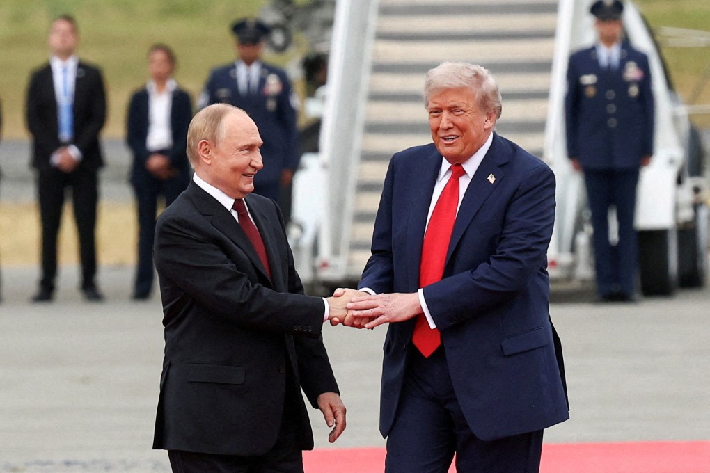 US President Donald Trump, right, shakes hand with Russian President Vladimir Putin at Joint Base Elmendorf-Richardson in Anchorage, Alaska, US on Friday. Photo: Reuters