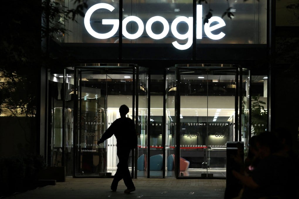 A pedestrian walks past the Google office in London on Thursday. Photo: Reuters