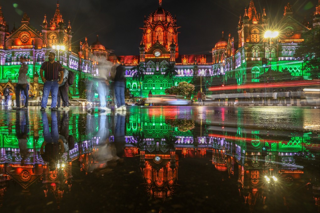 Chhatrapati Shivaji Terminus, a historic railway station in Mumbai, is illuminated as India celebrates 79 years of independence from British rule on August 15. Photo: EPA