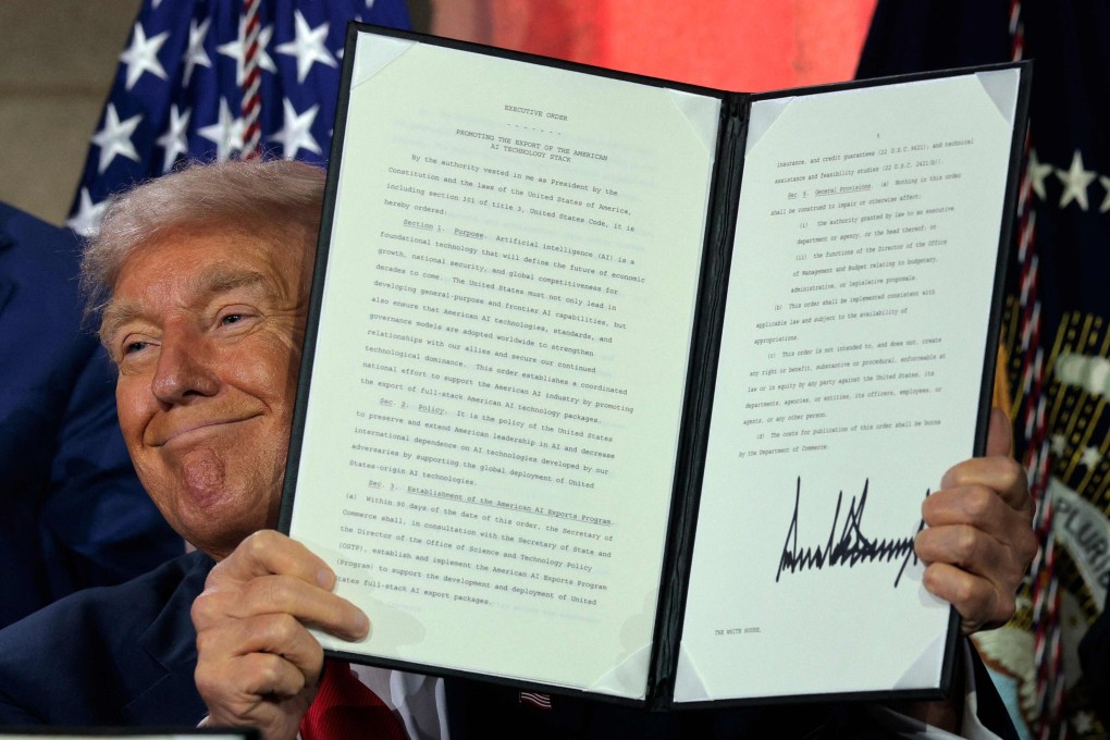 US President Donald Trump displays a signed executive order on July 23, related to his AI “Action Plan” intended to promote US dominance of the technology. Photo: Getty Images/AFP