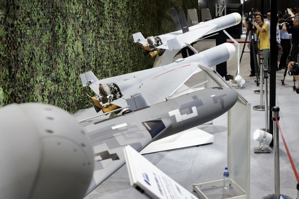 In 2023, journalists photograph suicide drones at the Taipei Aerospace and Defence Technology Exhibition in Taiwan. Tender documents this week reveal the island plans to step up military drone use. Photo: EPA-EFE