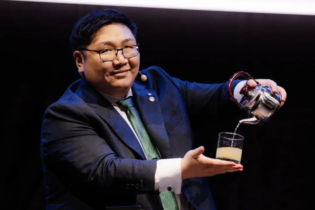 Canadian magician Billy Hsueh performs his take on the Think a Drink beverage-pouring trick at the 2025 Fism Championship of Magic in Italy. The illusionist says his goal is to make sure those who watch him have fun. Photo: Billy Hsueh
