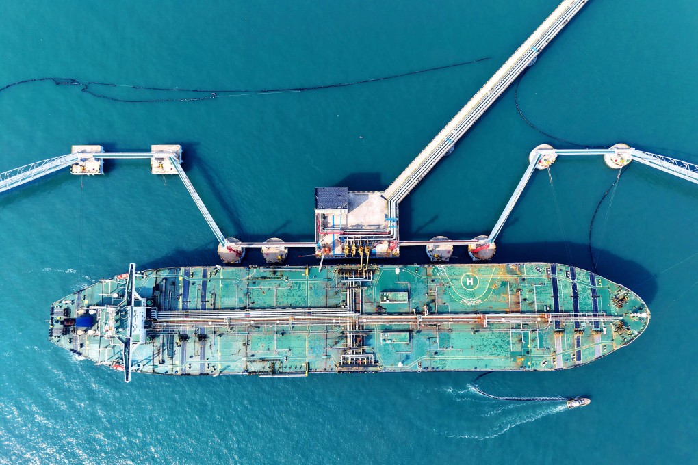 A cargo ship offloads imported crude oil at Qingdao Port in China’s Shandong province, in March. Photo: Getty Images