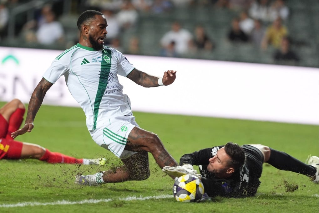 Al-Ahli striker Ivan Toney clashes with Al-Qadsiah’s goalkeeper Koen Casteels during their side’s Saudi Super Cup semi-final at Hong Kong Stadium. Photo: Elson Li