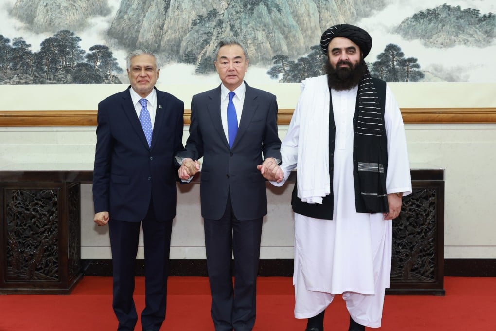 Foreign ministers Ishaq Dar (Pakistan, left), Wang Yi (China) and Amir Khan Muttaqi (Afghanistan) pictured at their previous meeting in Beijing in May. Photo: Xinhua