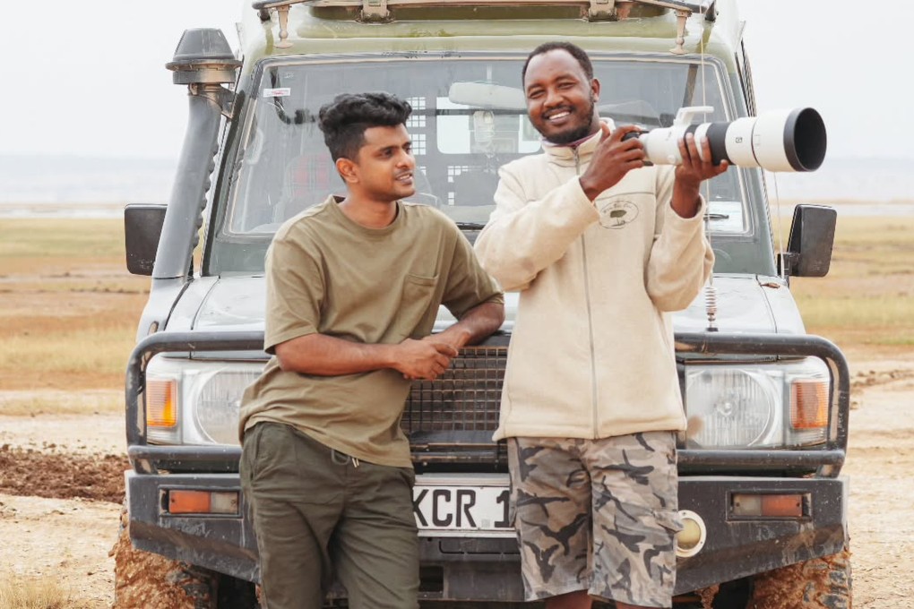 Malaysian photographer Tinesh Sritharan (left) is in Kenya to shoot the Great Migration. Photo: Instagram/ stineshinarw