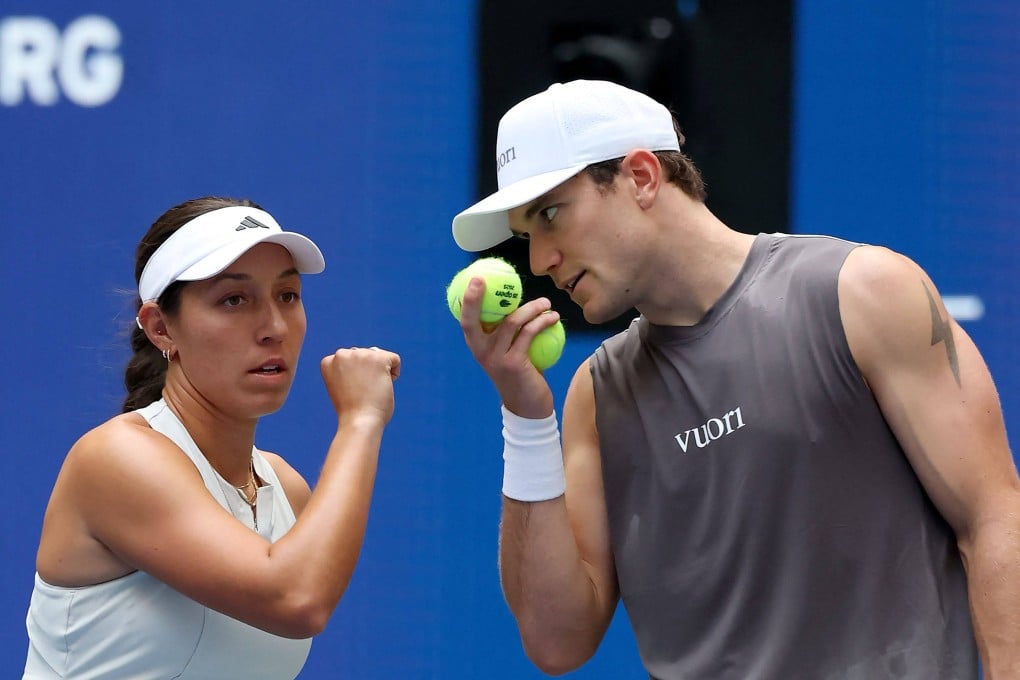 Mixed doubles pair Jessica Pegula (left) and Jack Draper in discussion during their match against Daniil Medvedev and Mirra Andreeva. Photo: AFP