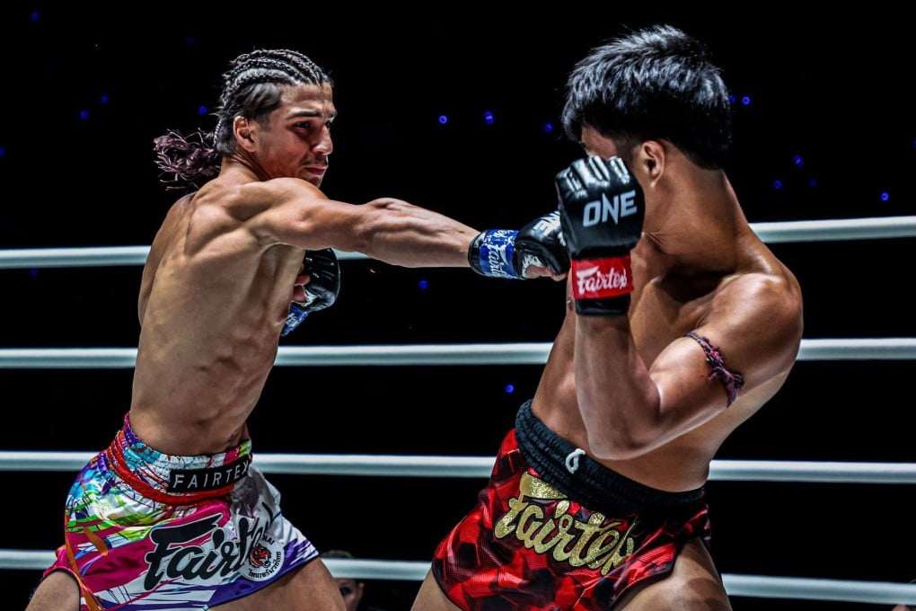 Teenage fighter Ramadam Ondash (left) lands a punch. Photo: ONE Championship