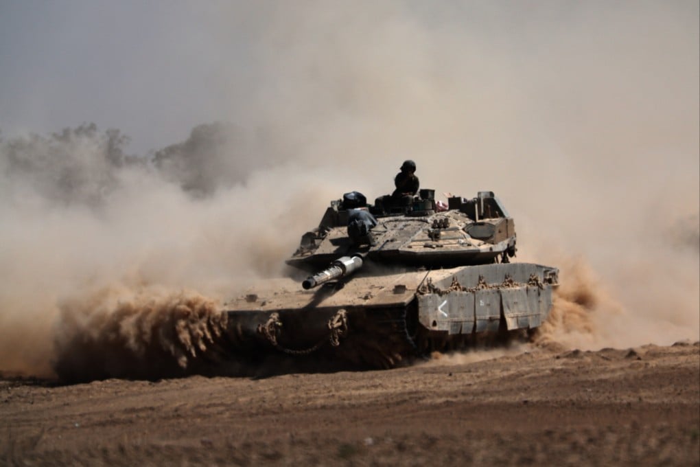 An Israeli tank manoeuvres in Gaza on August 19. Photo: EPA