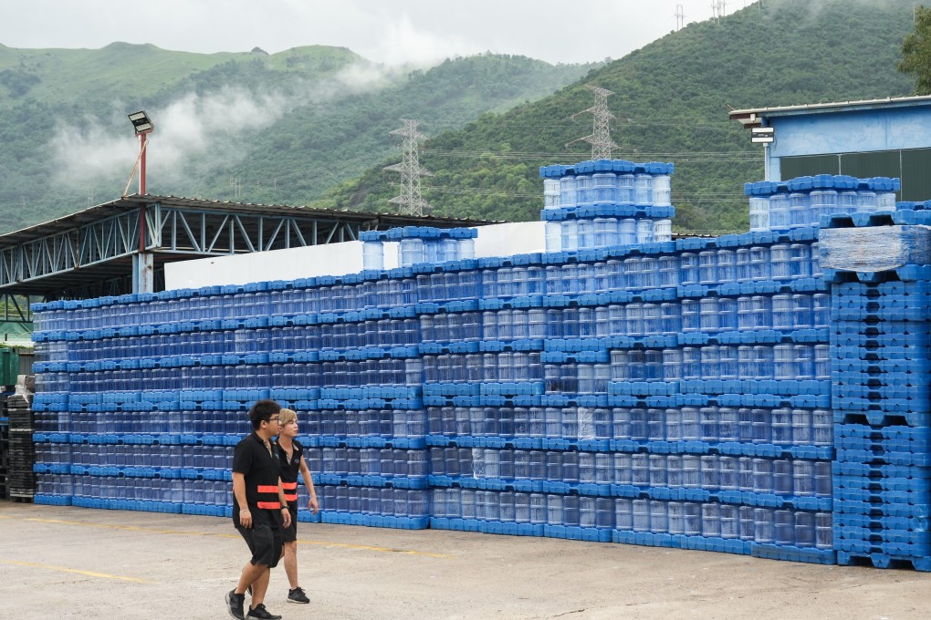 Empty distilled water bottles. Photo: Sam Tsang