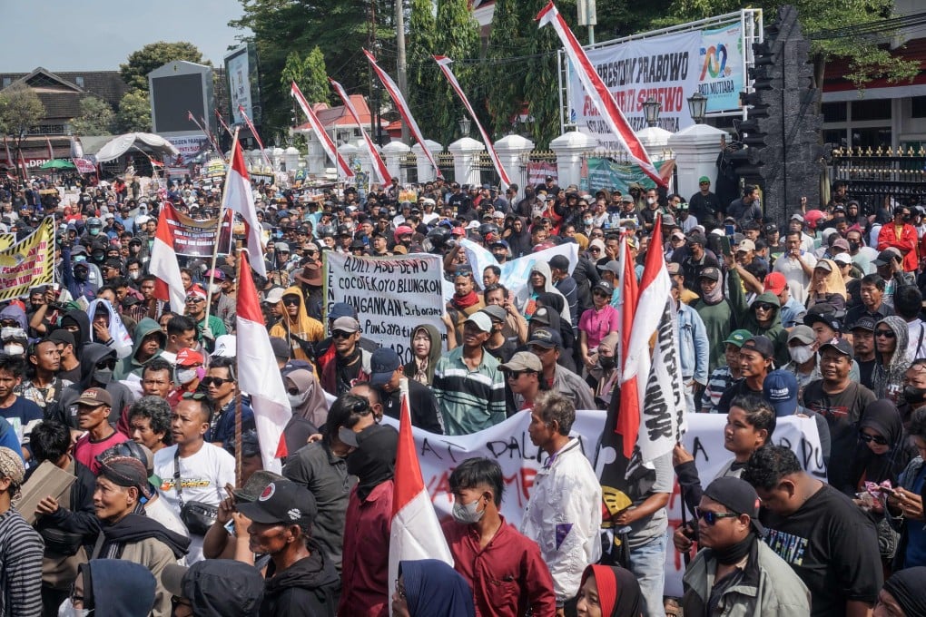 People take to the streets to protest against plans to raise local land and building taxes by 250 per cent, in Pati, Central Java, on August 13. Photo: AFP