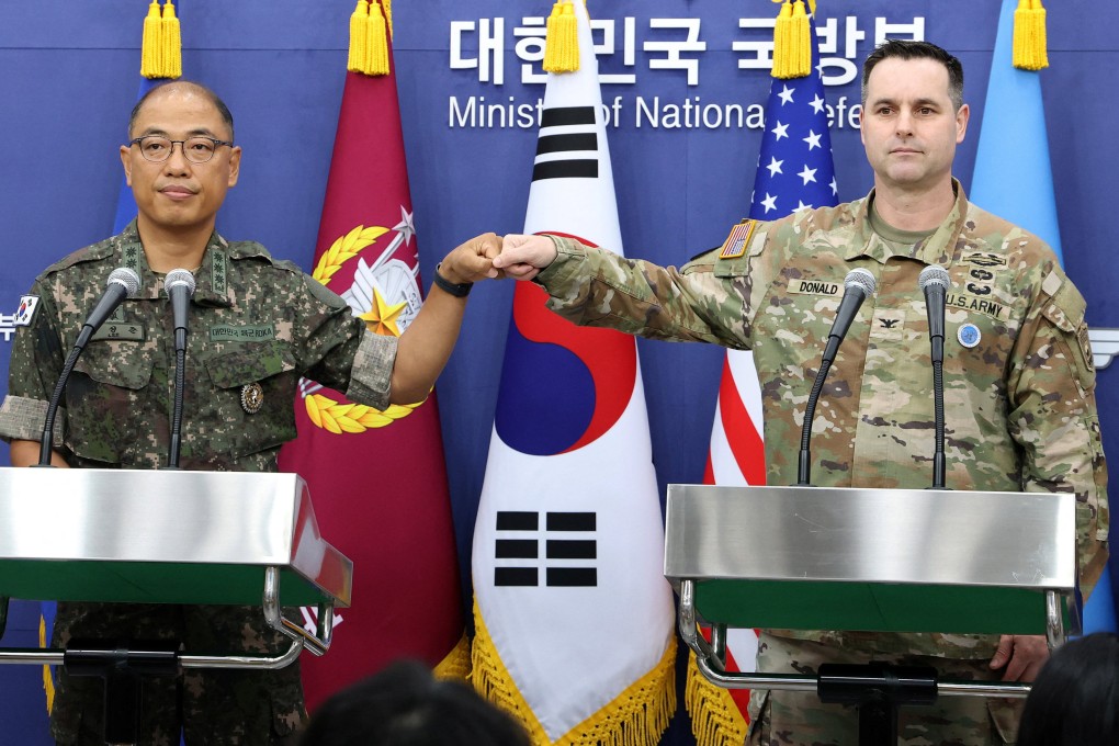 Colonel Lee Sung-jun (left) public affairs director of South Korea’s Joint Chiefs of Staff, and Colonel Ryan Donald, public affairs director of the United States Forces Korea, attend a press briefing on the Ulchi Freedom Shield exercises at the Defence Ministry in Seoul on August 7. Photo: Reuters