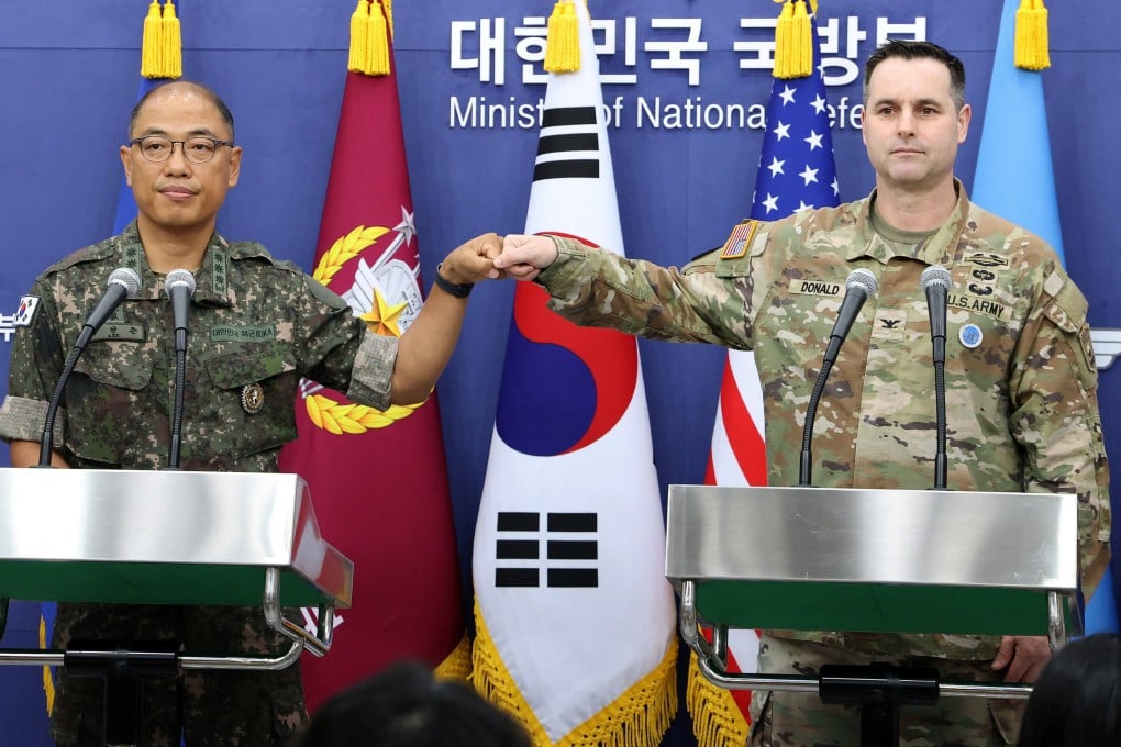 Colonel Lee Sung-jun (left) public affairs director of South Korea’s Joint Chiefs of Staff, and Colonel Ryan Donald, public affairs director of the United States Forces Korea, attend a press briefing on the Ulchi Freedom Shield exercises at the Defence Ministry in Seoul on August 7. Photo: Reuters