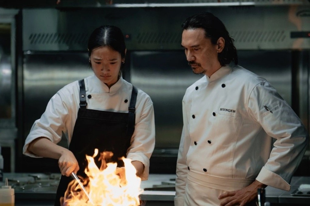 Chutimon Chuengcharoensukying (left) and Nopachai Chaiyanam as Chef Paul in a still from “Hunger”, a food-centric drama about Thailand’s rich-poor divide. Photo: Netflix