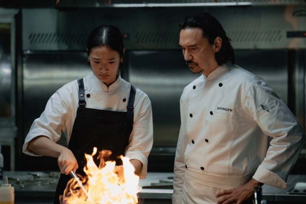 Chutimon Chuengcharoensukying (left) and Nopachai Chaiyanam as Chef Paul in a still from “Hunger”, a food-centric drama about Thailand’s rich-poor divide. Photo: Netflix