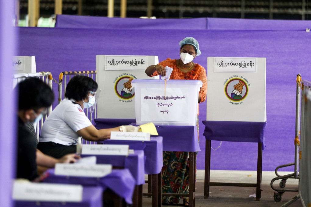 A voter casting her ballot at a polling station on November 8, 2020, in Yangon. Myanmar’s next election is slated to begin on December 28, with additional stages to follow. Photo: AP