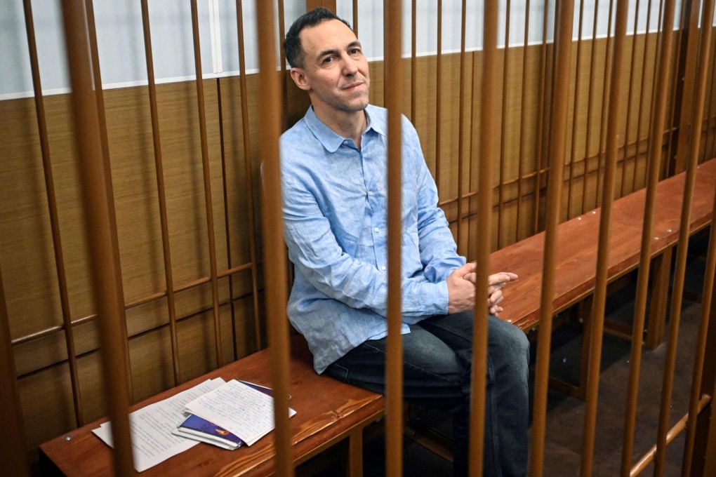 French researcher Laurent Vinatier sits inside a defendants’ cage during a hearing at  Zamoskvoretsky district court in Moscow, Russia, in October. Photo: AFP