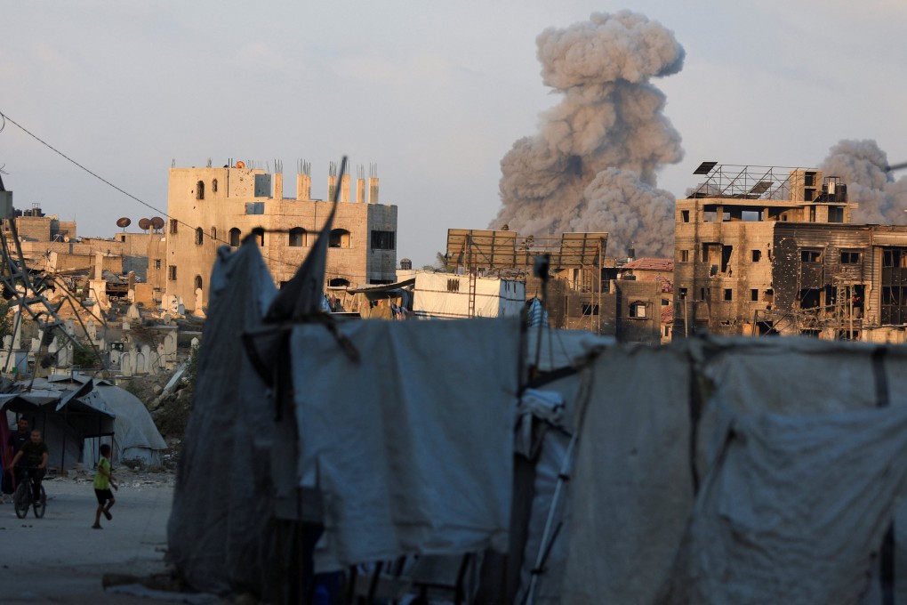 Smoke rises following an Israeli strike, in Gaza City on Thursday. Photo: Reuters