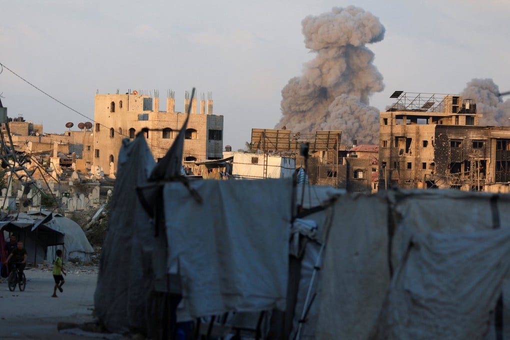 Smoke rises following an Israeli strike, in Gaza City on Thursday. Photo: Reuters