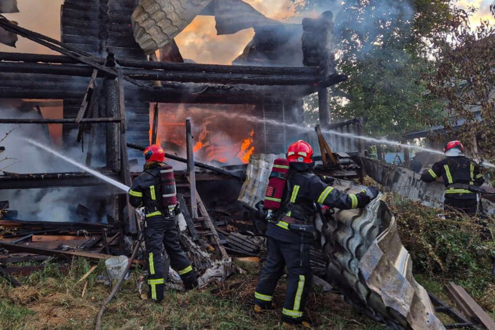 Firefighters work at the site of a residential area hit during Russian drone and missile strikes, in Lviv region, Ukraine, on Thursday. Photo: Press service of the State Emergency Service of Ukraine in Lviv region/Handout via Reuters
