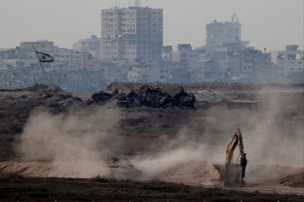 An Israeli tank manoeuvres in Gaza as seen from the Israeli side of the border on Wednesday. Photo: Reuters
