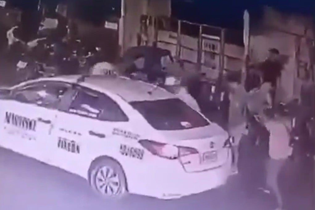 Screenshot of CCTV camera footage showing the moment before two Japanese nationals were shot and killed in Manila’s Ermati district on August 15. Photo: Handout