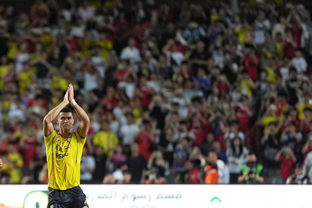 Cristiano Ronaldo applauds supporters after being substituted towards the end of Al-Nassr’s victory over Al-Ittihad. Photo: Elson Li