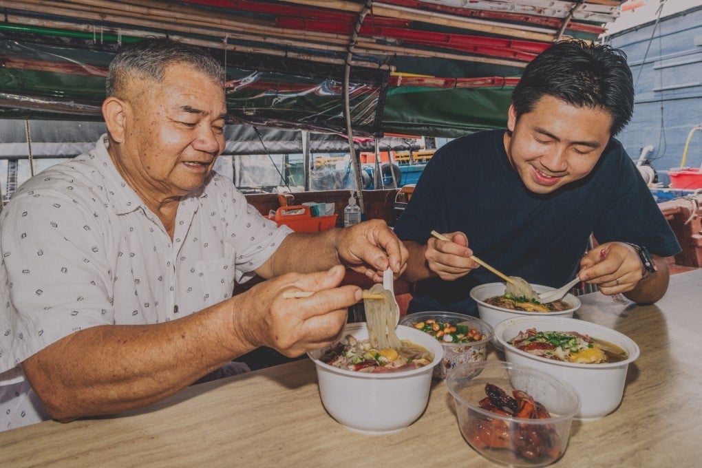 Lam Lau with his son Aidan at Lau Kee Boat Noodles in Hong Kong, which has been in business since 1981. Photo: Jocelyn Tam