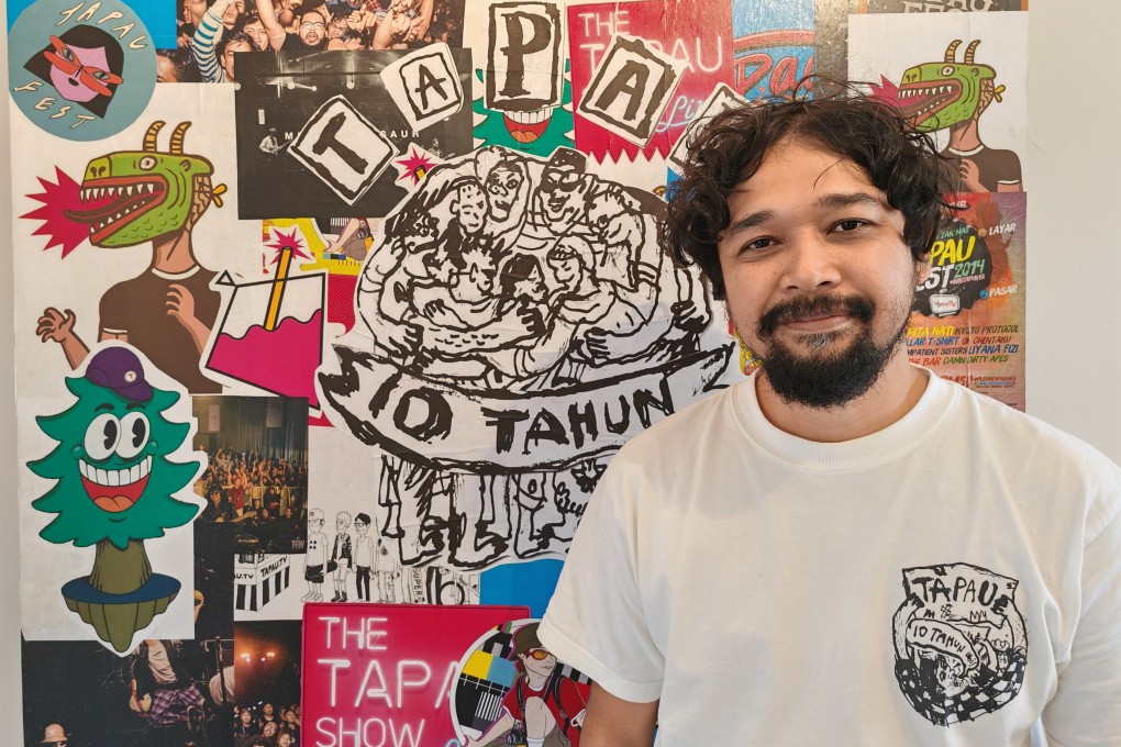 Ahmad Faris, the founder of Tapaufest, with a montage of the various posters promoting the festival over the years. Photo: Joseph Sipalan