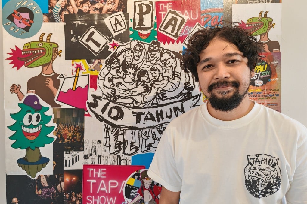 Ahmad Faris, the founder of Tapaufest, with a montage of the various posters promoting the festival over the years. Photo: Joseph Sipalan