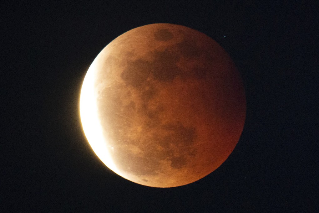 A red moon during a total lunar eclipse above Hong Kong’s skies on May 26, 2021. Photo: Sam Tsang