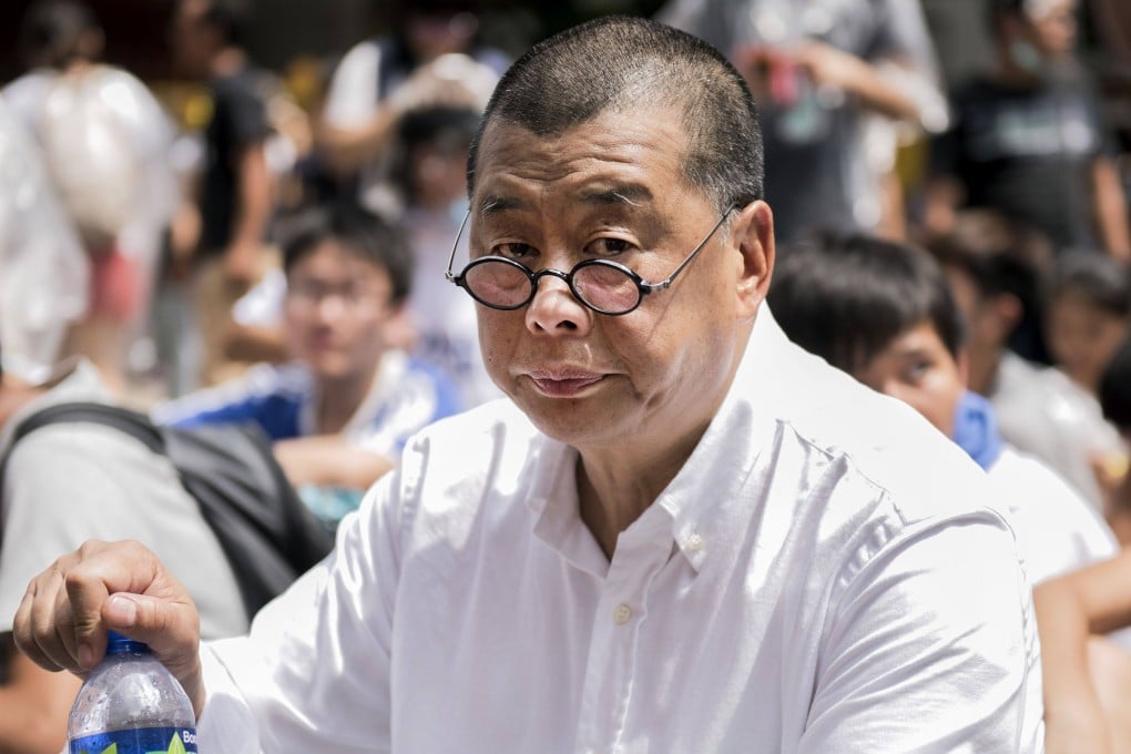 Apple Daily founder Jimmy Lai is contesting two conspiracy counts of collusion with foreign forces and a third of conspiracy to print seditious articles. Photo: AFP
