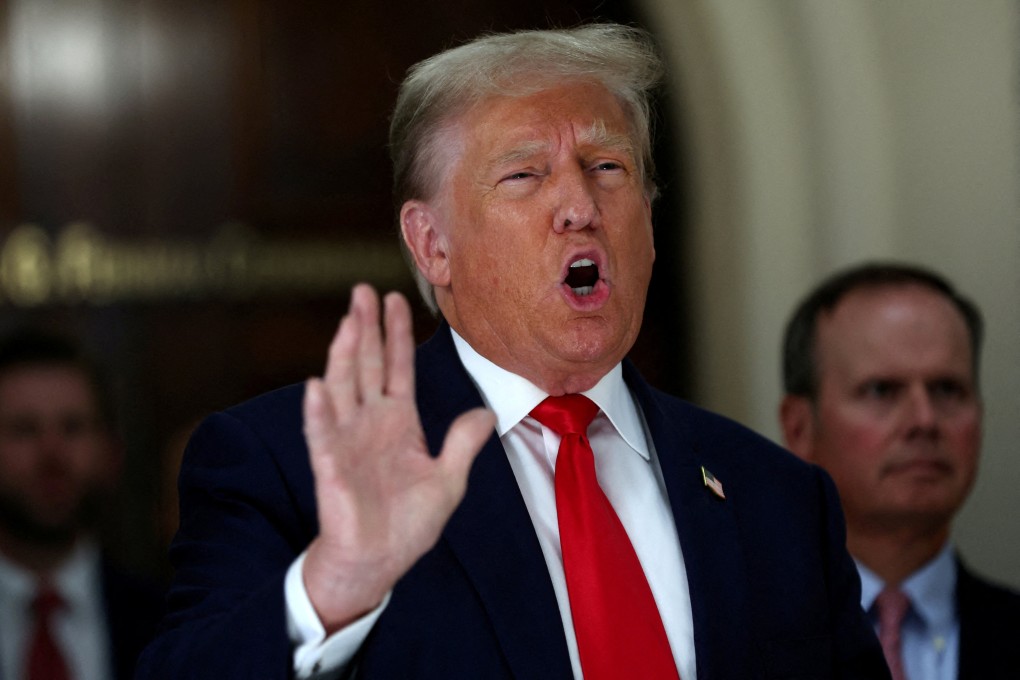 Donald Trump gestures while talking to the media during a break as he attends trial in a civil fraud case brought by state Attorney General Letitia James against him, his adult sons, the Trump Organisation and others in New York in October 2023. Photo: Reuters