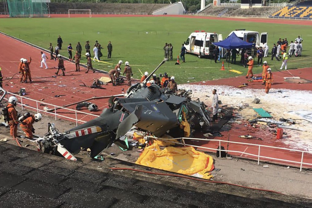 The wreckage of a Malaysian naval helicopter is seen in Perak following last April’s deadly collision. Photo: Facebook / Fire And Rescue Department Of Malaysia