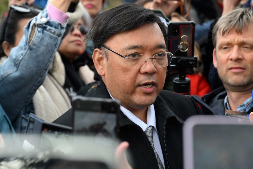 Harry Roque talks to journalists in The Hague on March 14. Photo: AFP