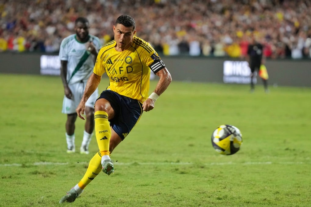 Al-Nassr’s Cristiano Ronaldo scores the first goal from the penalty spot at Hong Kong Stadium. Photo: Elson Li