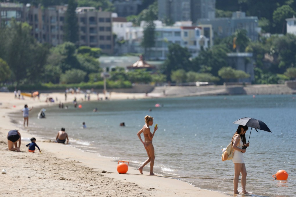 People enjoy the sun at Repulse Bay beach on Saturday. Photo: Karma Lo
