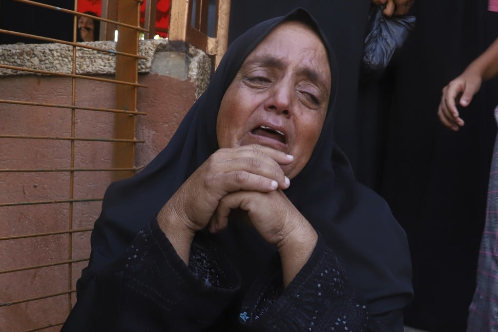 A Palestinian woman mourns her relative, who was killed in Israeli strikes outside Nasser Hospital in Khan Younis, southern Gaza Strip on Saturday. Photo: AP